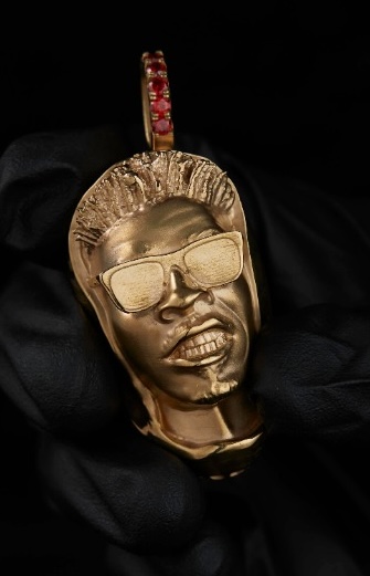 Gold portrait pendant created for Shatta Wale